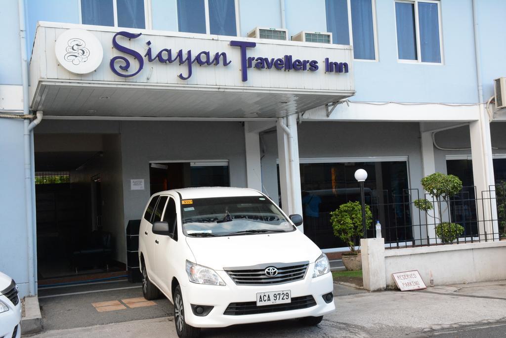 Siayan Travellers Inn Powered By Cocotel Manila Zewnętrze zdjęcie